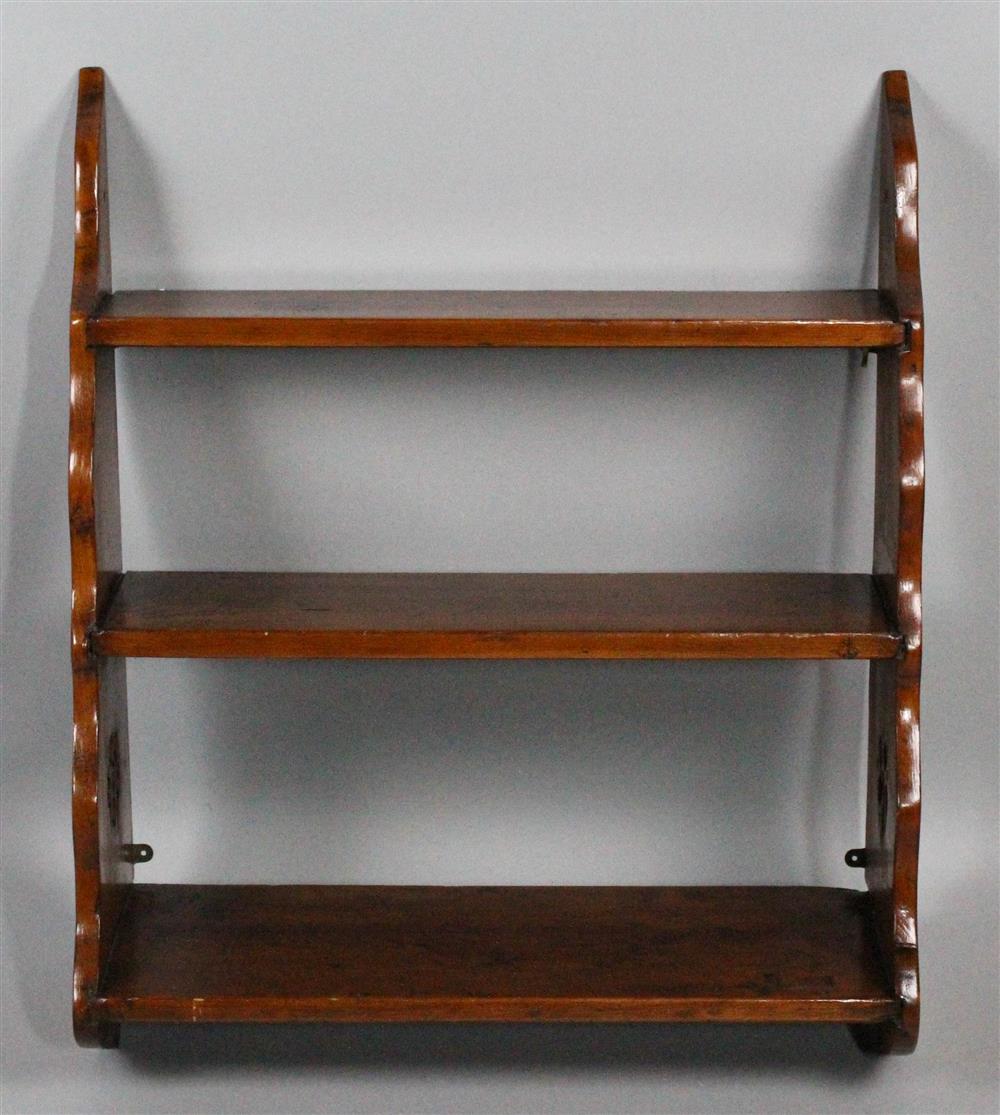 Appraisal: THREE TIER CARVED HANGING WALL SHELF having three levels of