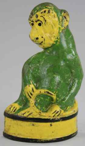 Appraisal: MONKEY ON BARREL DOORSTOP Part of Taylor Cook series marked