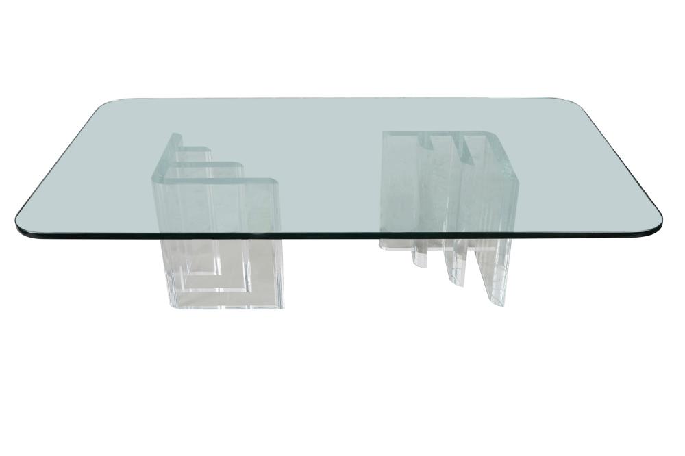 Appraisal: LUCITE GLASS COFFEE TABLEthe rectangular top with rounded corners Provenance