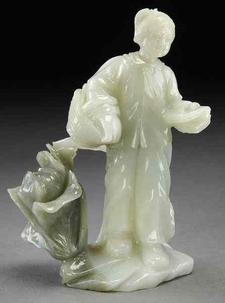 Appraisal: Chinese Cultural Revolution hard stone carvingdepicting a girl reading a