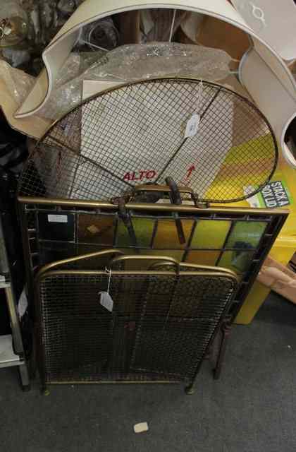 Appraisal: AN OLD BRASS FIREGUARD with leaded glass insert wide together