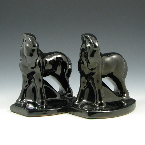 Appraisal: Frankoma Horse Bookends Thunderbird Canteen Pair of Frankoma mirror black