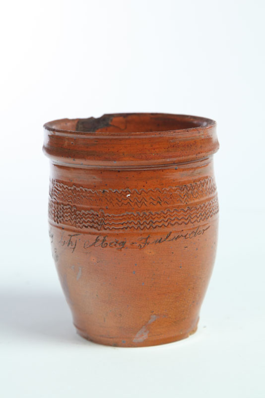 Appraisal: REDWARE JAR Virginia mid th century Small jar with incised