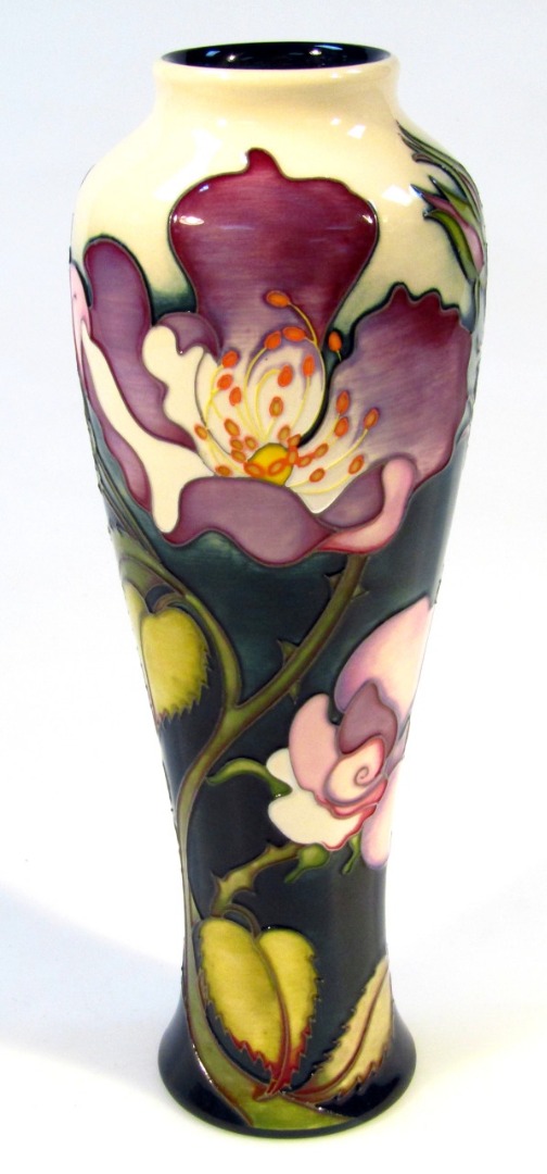 Appraisal: A Moorcroft pottery Moorcroft Floribunda Rose pattern vase of circular