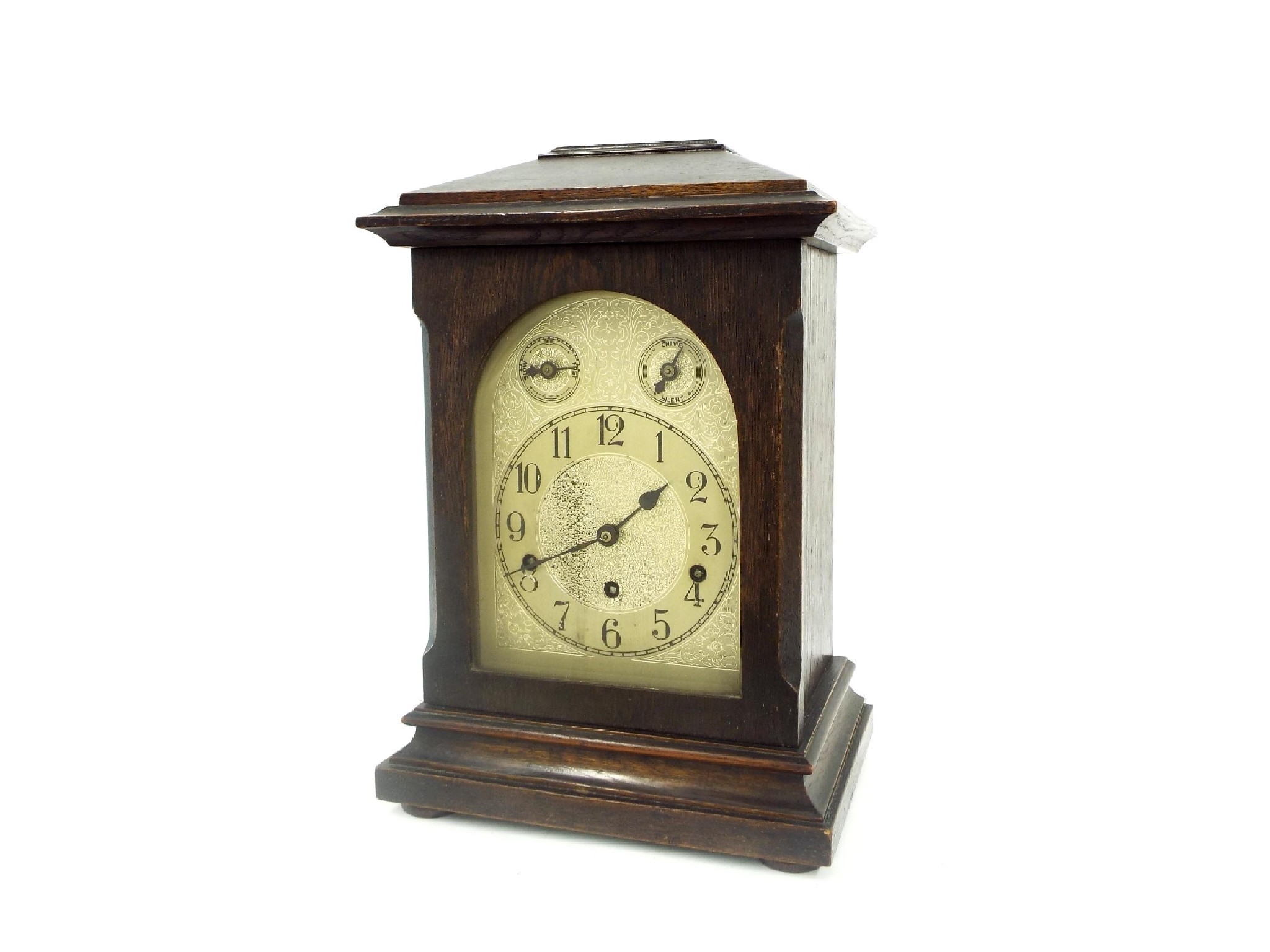 Appraisal: German oak three train mantel clock the movement striking on