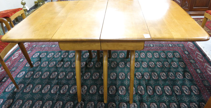 Appraisal: MID-CENTURY MODERN MAPLE DROP-LEAF DINING TABLE WITH TWO LEAVES Heywood-Wakefield