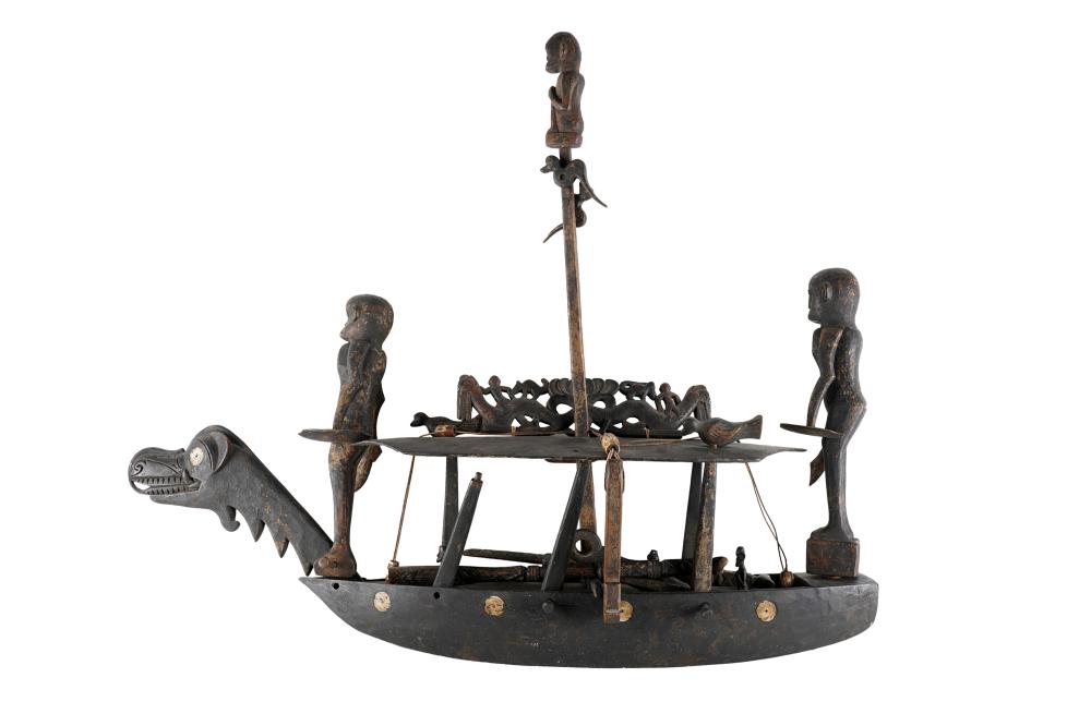 Appraisal: AFRICAN CARVED PAINTED WOOD BARGE FIGURESCondition with various possible missing