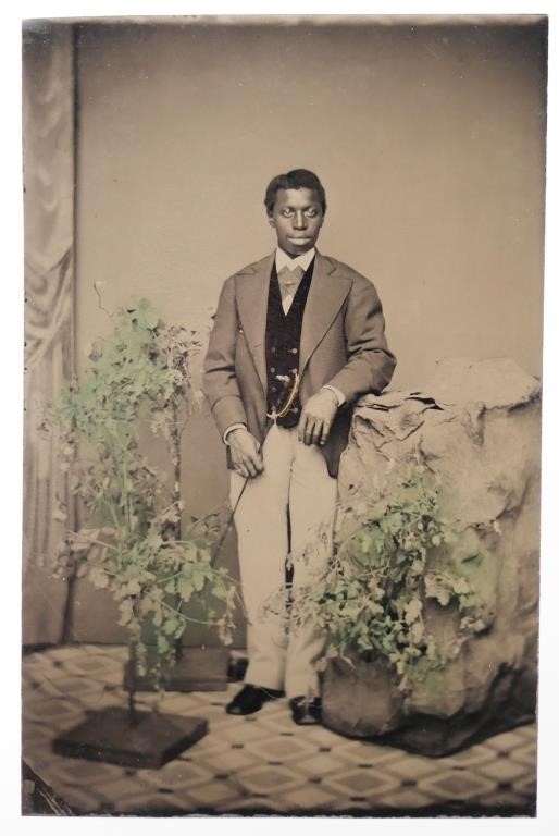 Appraisal: Tintype sixth plate photograph depicting a young black man elegantly