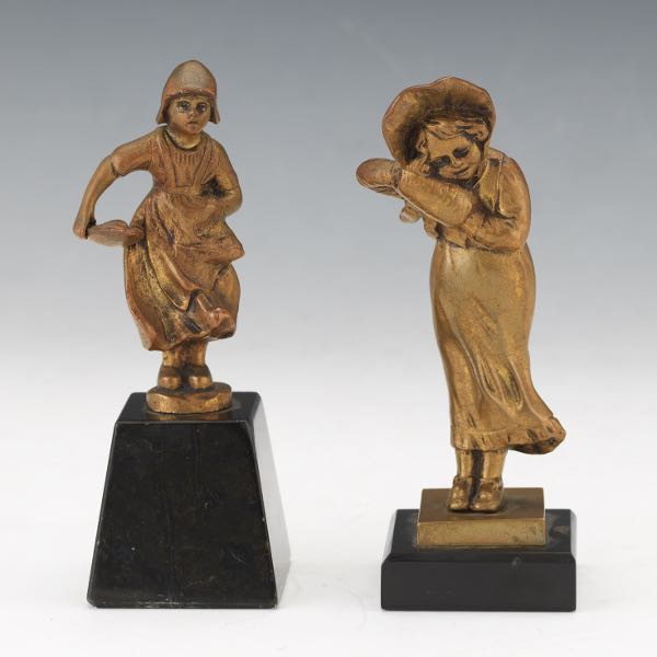 Appraisal: TWO BRONZE CABINET SCULPTURES OF YOUNG WOMEN Bronze sculpture of