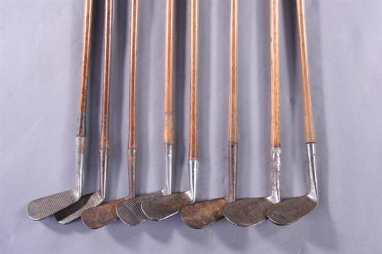 Appraisal: EIGHT VARIOUS IRON GOLF CLUBS FROM THE FORGE OF GEORGE