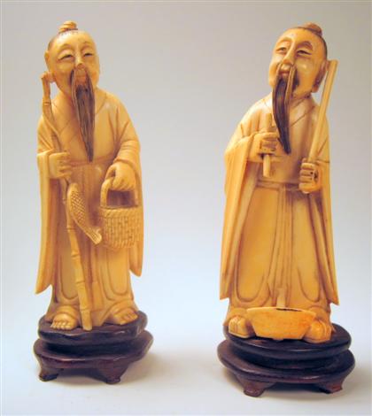 Appraisal: Pair of Chinese elephant ivory figureslate th century