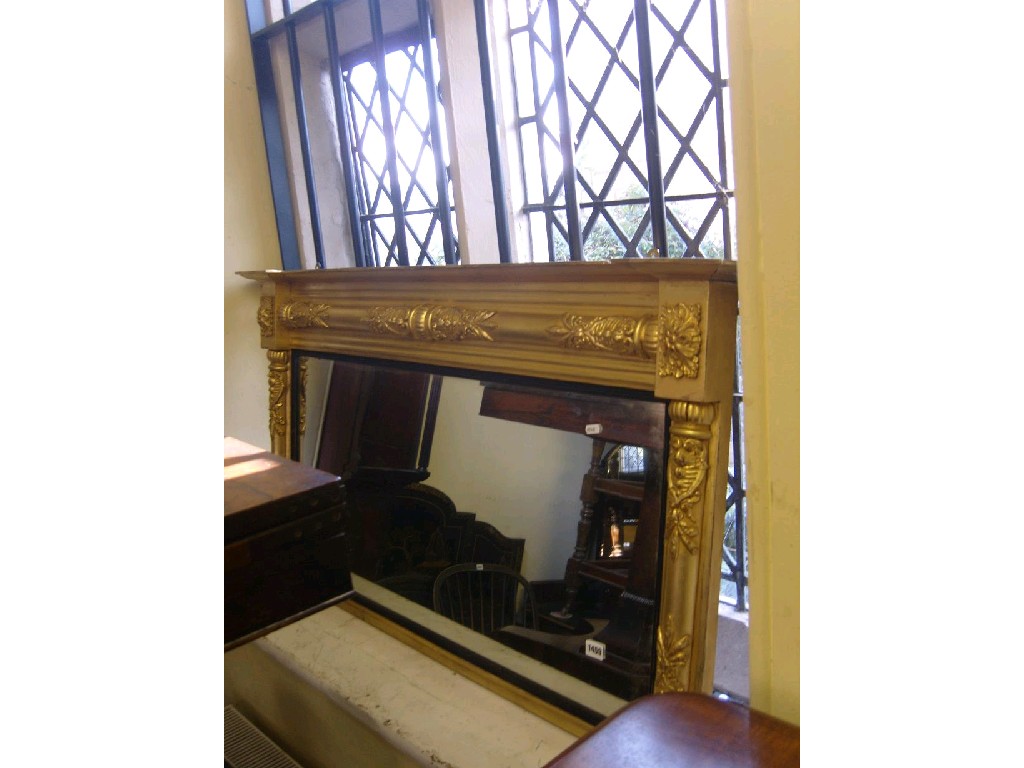 Appraisal: A Regency gilt framed overmantle mirror of rectangular form with