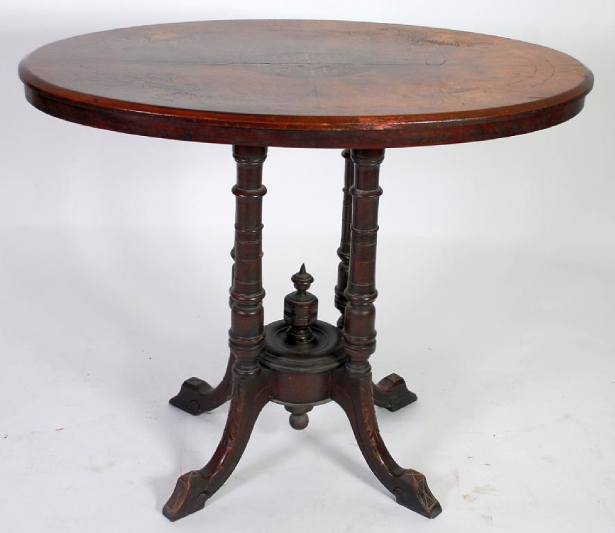 Appraisal: VICTORIAN MARQUETRY INLAID WALNUT OCCASIONAL TABLE the oval quarter veneered