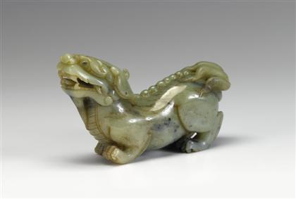 Appraisal: Chinese carved jade figure of a dog th century Depicted