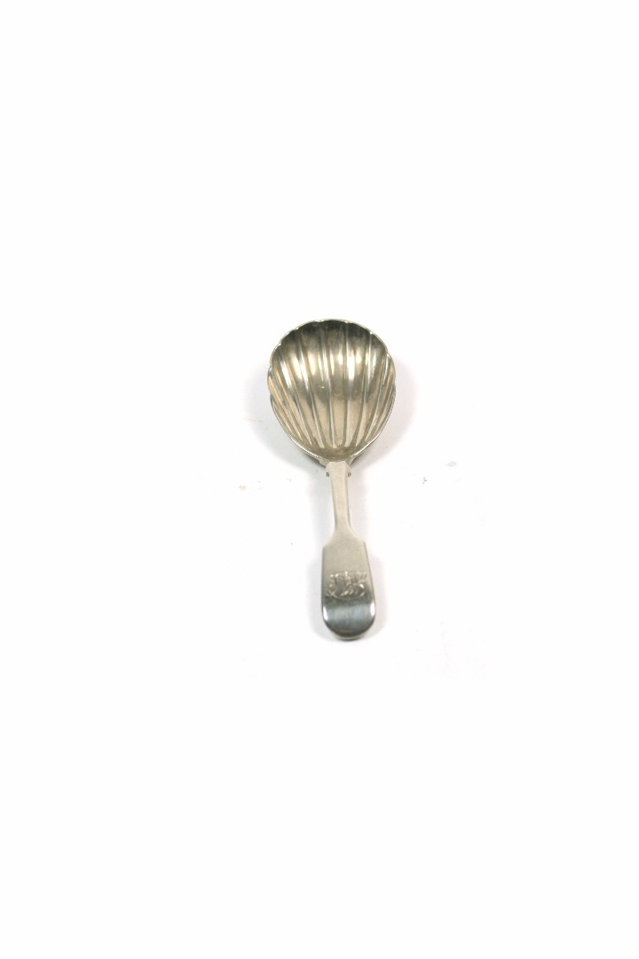 Appraisal: A Victorian silver fiddle pattern caddy spoon Henry John Henry