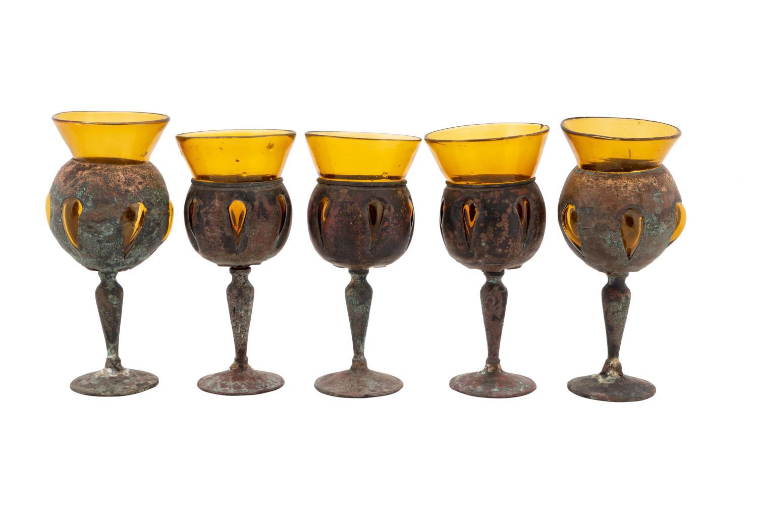 Appraisal: FIVE DERFLINGHER STYLE IRON AMBER GLASS GOBLETS Set of five