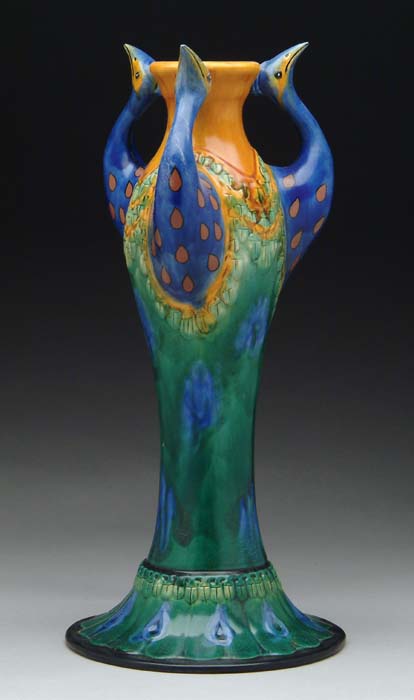 Appraisal: ART DECO POTTERY VASE Contemporary vase starts with three peacock