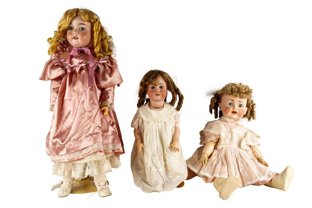 Appraisal: THREE GERMAN PORCELAIN HEAD DOLLSCondition hair on each doll needs