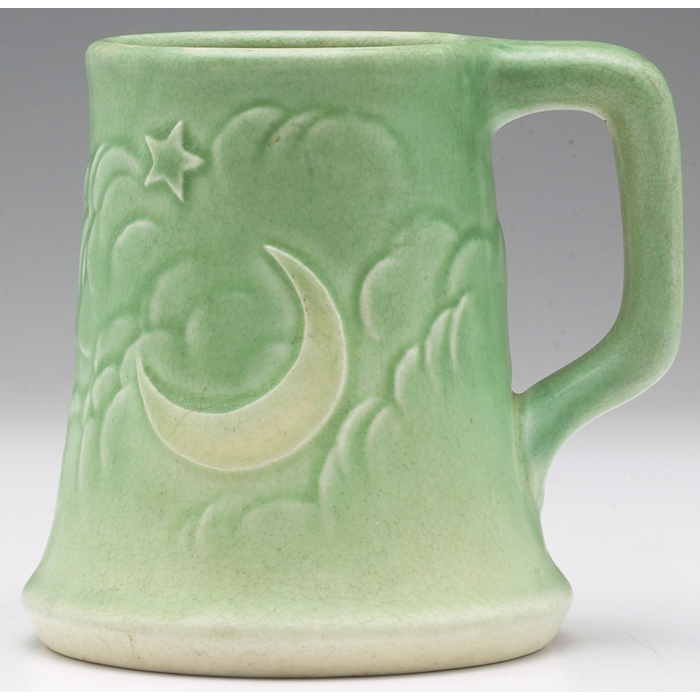 Appraisal: Rookwood mug star and crescent moon design covered in a