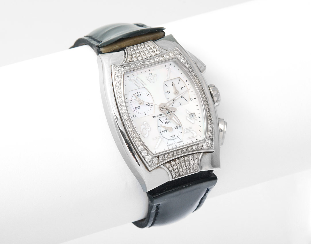 Appraisal: TECHNOMARINE DIAMOND STAINLESS WATCH Stainless case with diamonds and original