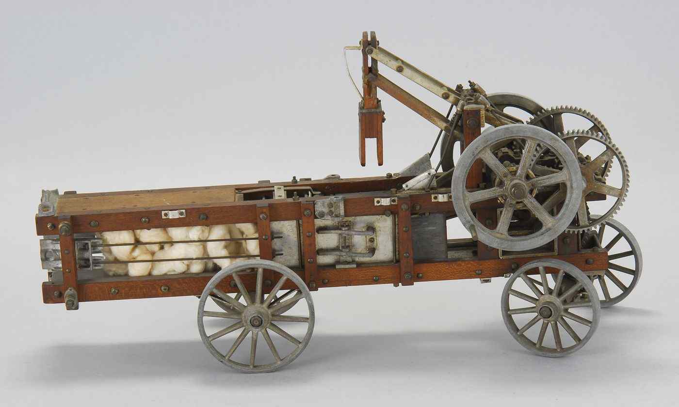 Appraisal: HIGHLY UNUSUAL CRANK-OPERATED WORKING MODEL OF A COTTON BALEREarly th