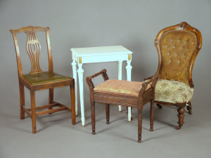 Appraisal: A set of four Chippendale style oak dining chairs late