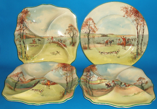 Appraisal: Fox Hunting Plate D and Set Four Sectional Dishes Decorated