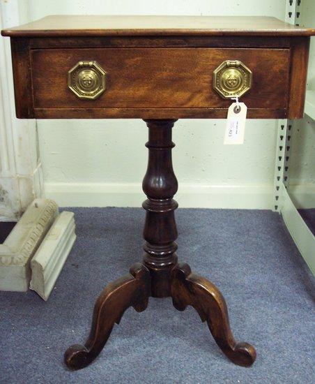 Appraisal: A mahogany table the rectangular top with a drawer to