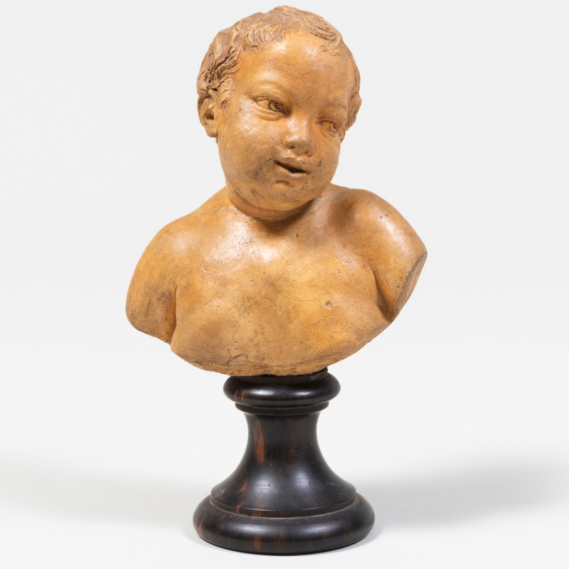 Appraisal: TERRACOTTA BUST OF A CHILD Indistinctly signed left side reverse