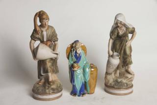 Appraisal: Figurines Pair of Painted Bisque Figures Mud Figure