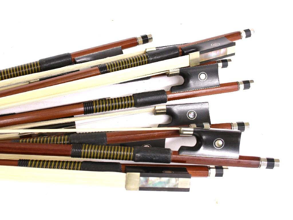 Appraisal: Ten new nickel mounted violin bows