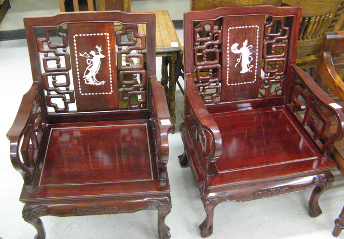 Appraisal: PAIR OF CHINESE ARMCHAIRS of carved and mother-of-pearl inlaid rosewood