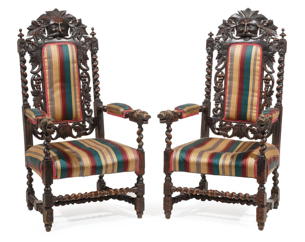 Appraisal: Pair of Elizabethan-Style Carved Walnut Armchairs masque crest grape and