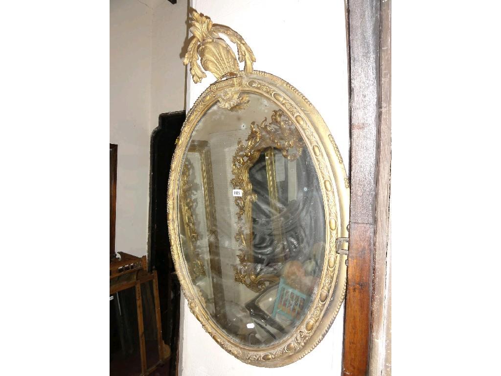 Appraisal: A th century gilt framed wall mirror of oval form