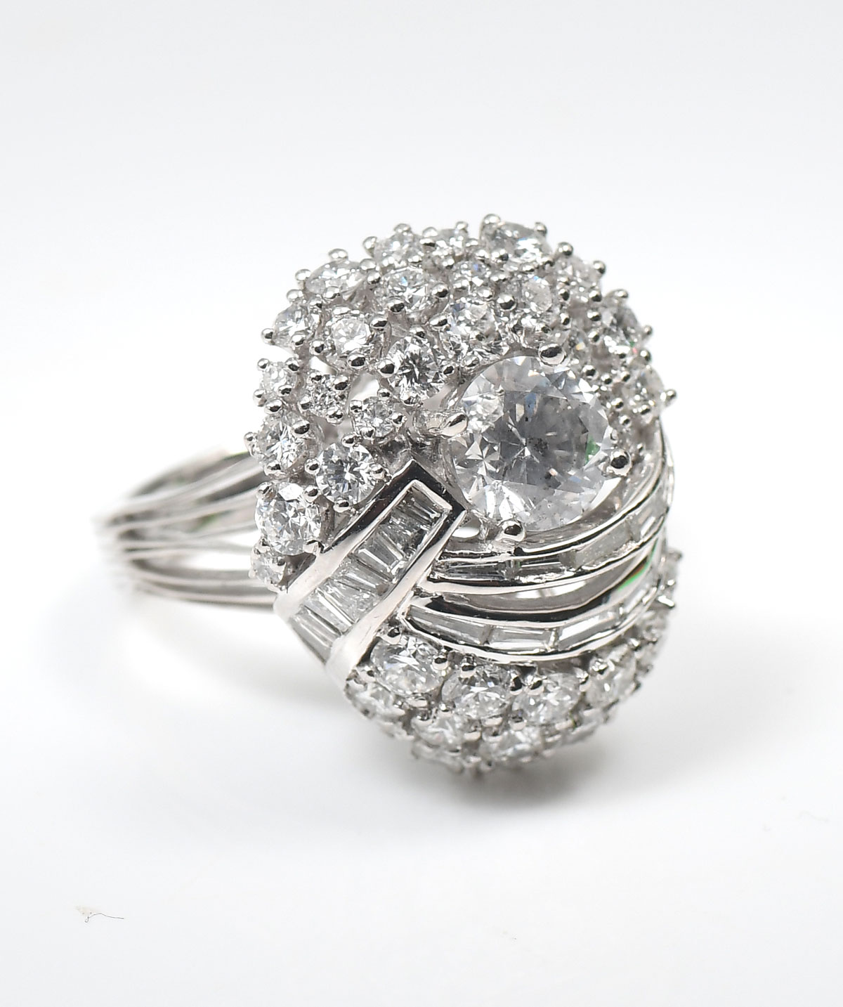 Appraisal: CTW PLATINUM DIAMOND RING Eye catching platinum ring features a