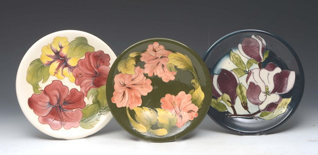 Appraisal: A WALTER MOORCROFT GREEN GROUND BOWL with anemone design cm