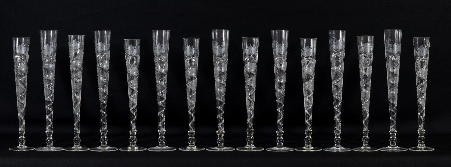 Appraisal: th century engraved champagne flutes with applied glass swirls each