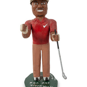 Appraisal: A Folk Art Carved and Painted Tiger Woods Figure by