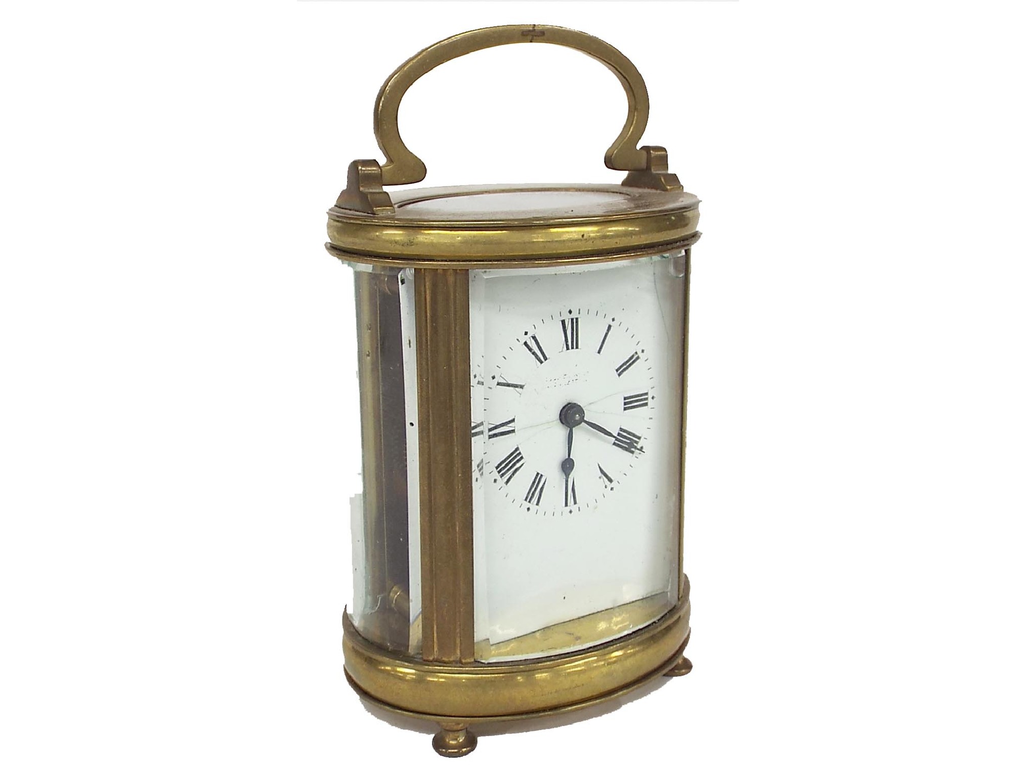 Appraisal: French oval brass carriage clock timepiece the white dial with