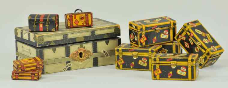 Appraisal: TOY LUGGAGE Lot includes lithographed tin luggage by Marx and