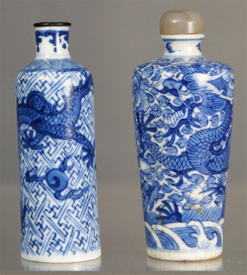 Appraisal: Cylindrical porcelain snuff bottles with blue underglaze dragon seeking flaming