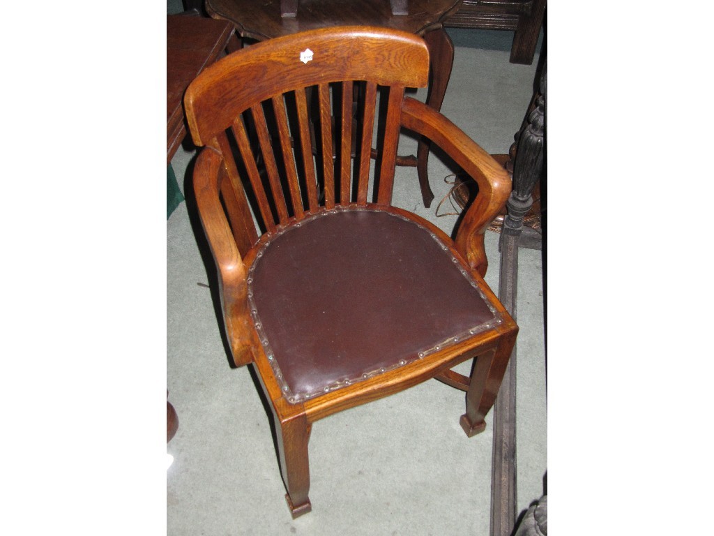 Appraisal: Oak captains chair