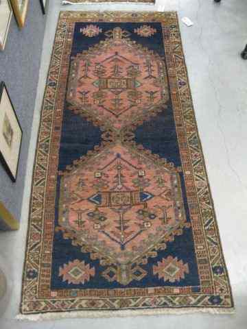 Appraisal: Sarab Persian Handmade Rug salmon geometrics on blue field '