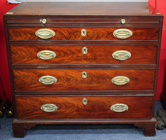 Appraisal: A GEORGE III MAHOGANY CADDY TOP CHEST of four long