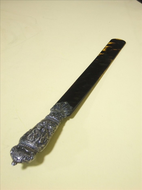 Appraisal: VICTORIAN TORTOISE SHELL PAGE TURNER Late th century Silver handle