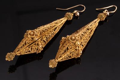 Appraisal: A pair of gold filigree ear pendants of torpedo shape