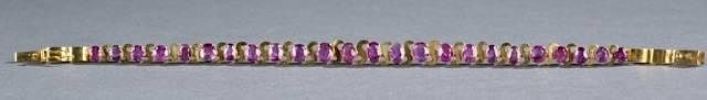 Appraisal: ct ruby and kt gold tennis bracelet A ruby and