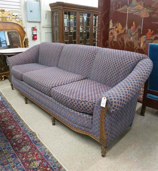 Appraisal: TRADITIONAL STYLE SOFA American c s having a carved and