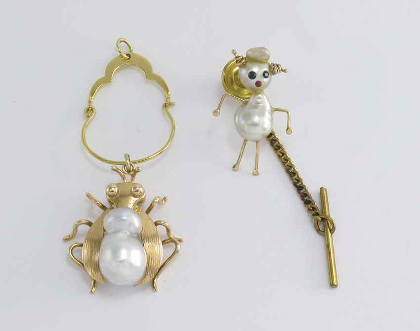 Appraisal: WHIMSICAL BAROQUE PEARL FIGURAL JEWELRY K yellow gold baroque pearl