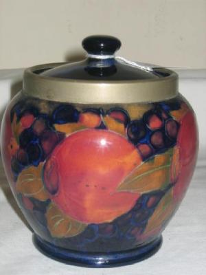 Appraisal: A WILLIAM MOORCROFT POTTERY BISCUIT BARREL of ovoid form with